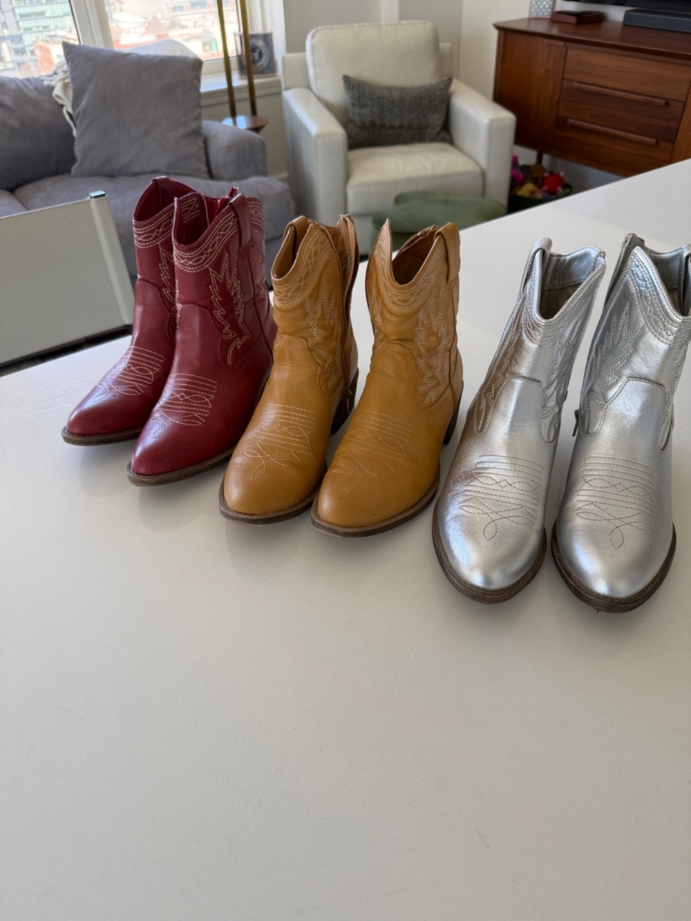 All (3) pairs of women’s  Western Ankle Boots - Red, Tan, Silver.